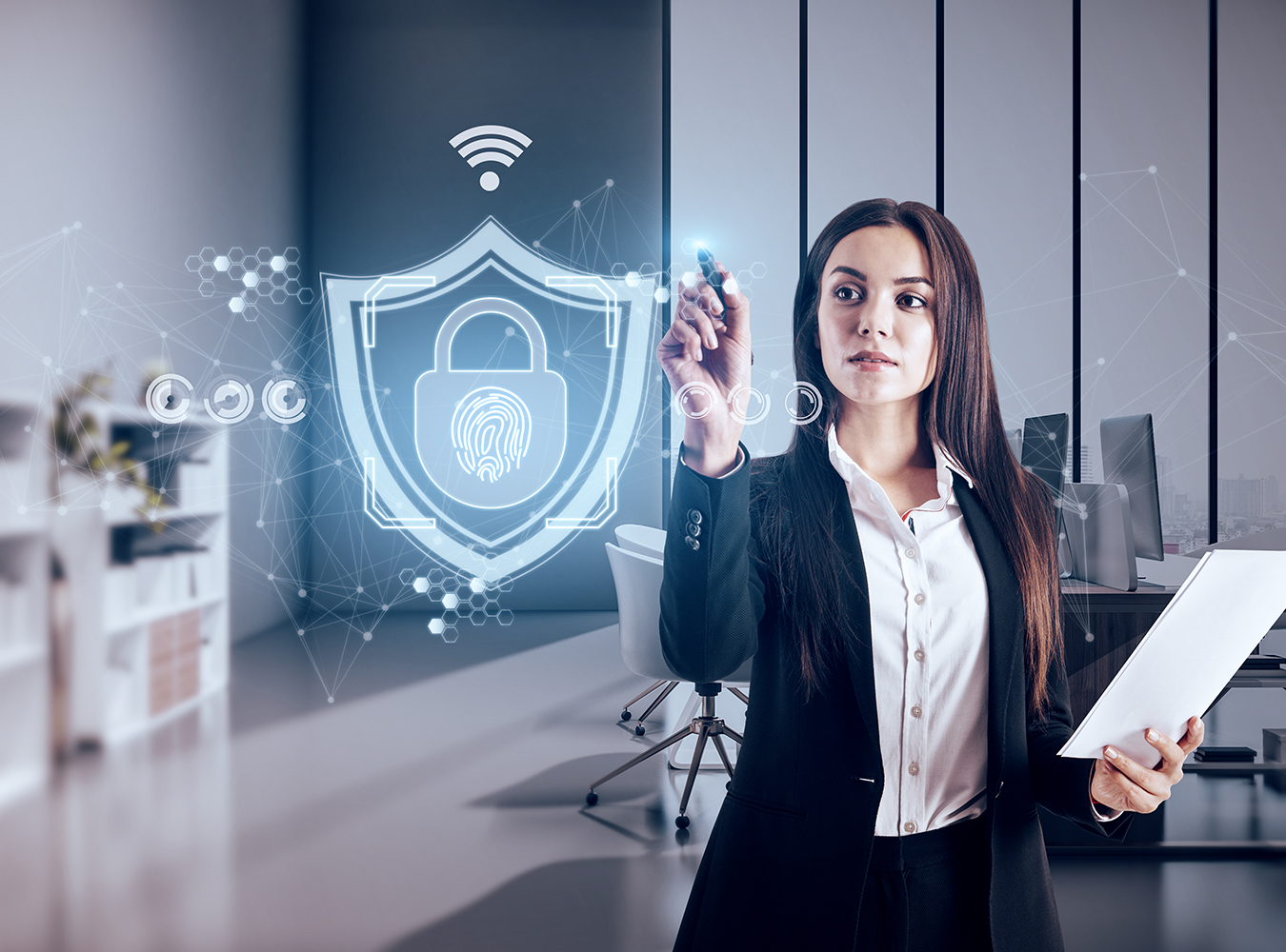 Attractive young european businesswoman with abstract web protection and thumbprint id safety hologram on blurry office interior background. Software and cybersecurity concept. Double exposure